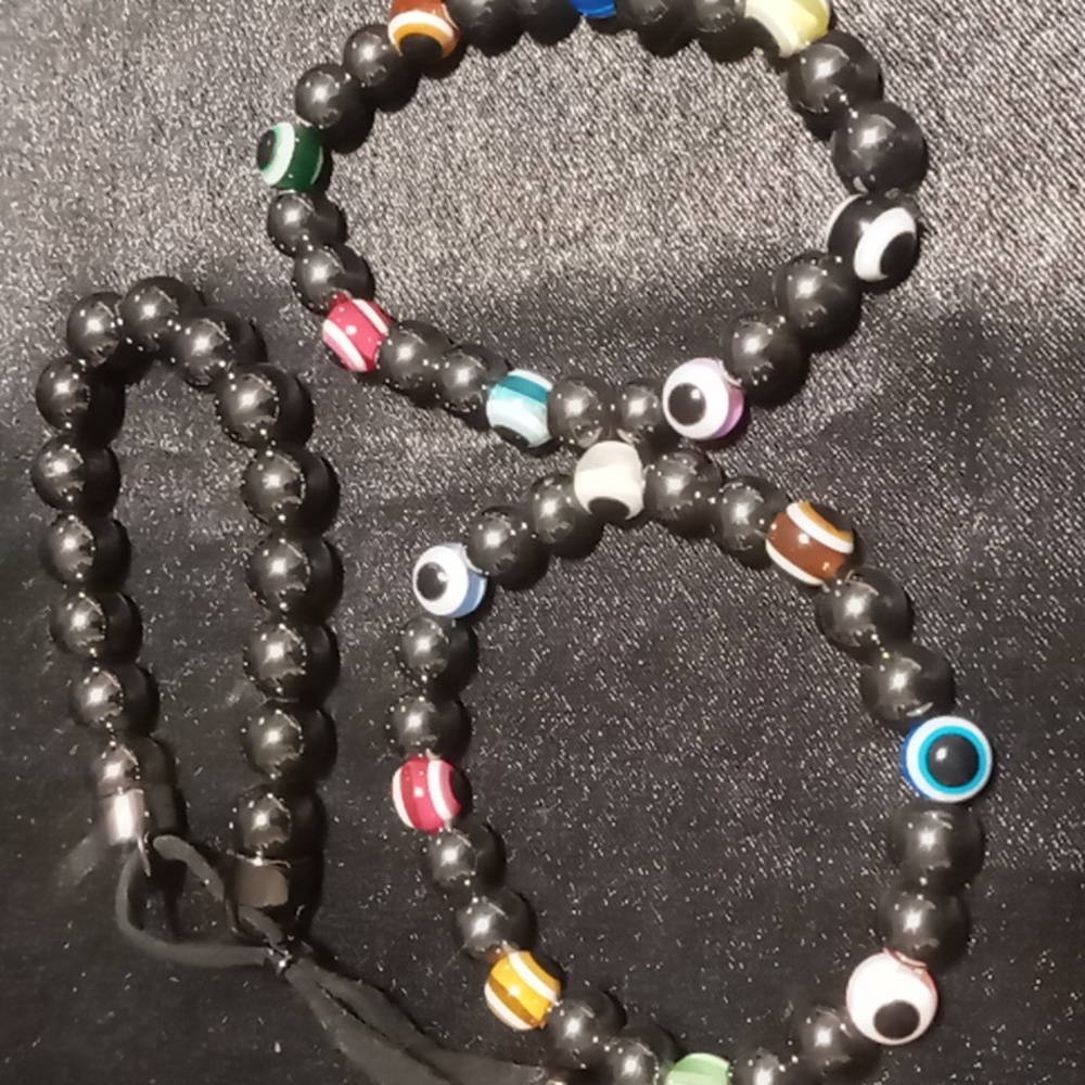 Three black magnatigh expandable bracelets 2/with evil eye glass beaded